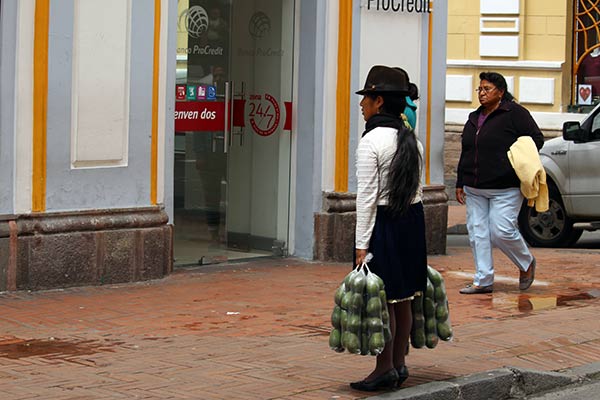 Woman Stands in the Street of Ecuador
