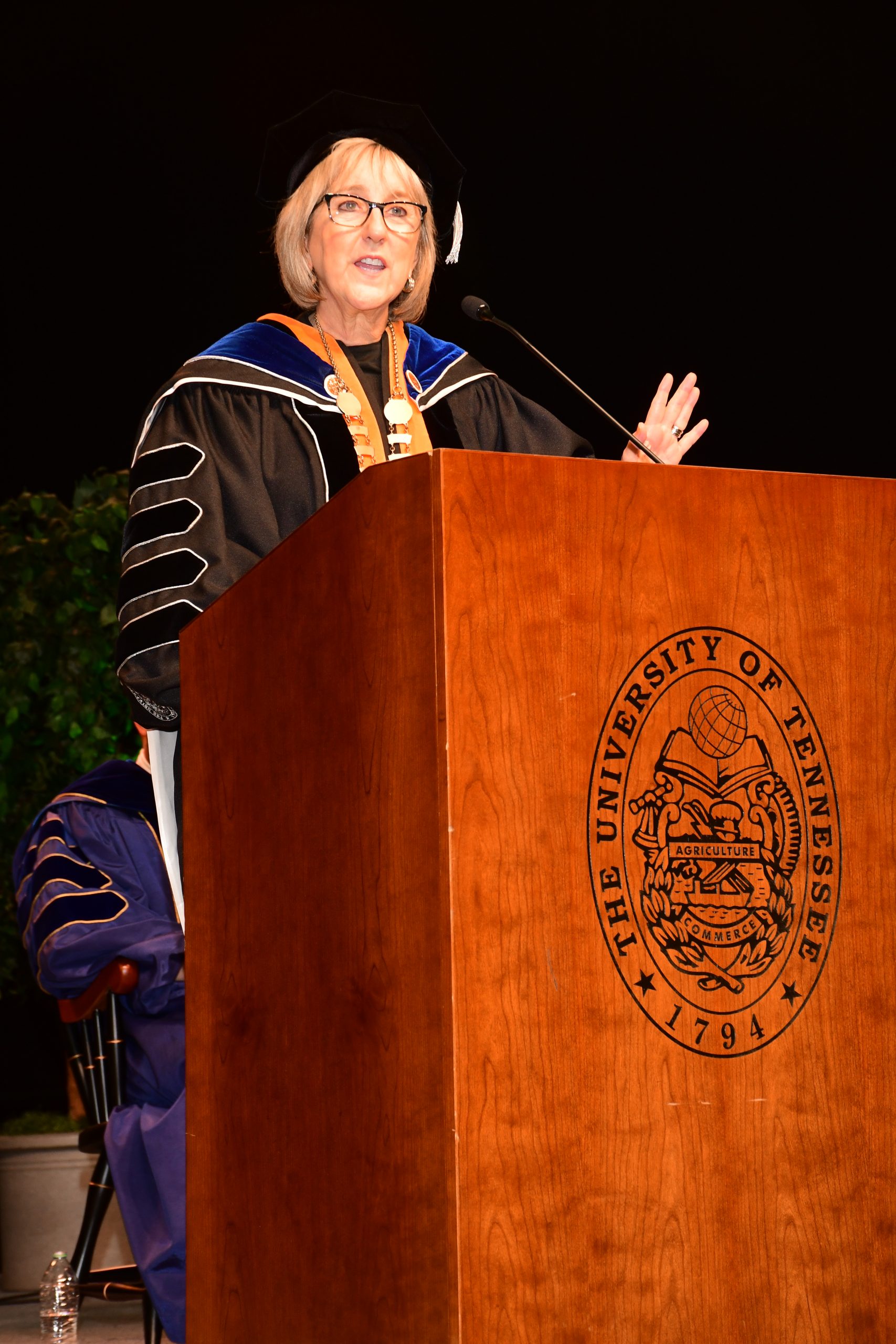 Donde Plowman speaking at commencement