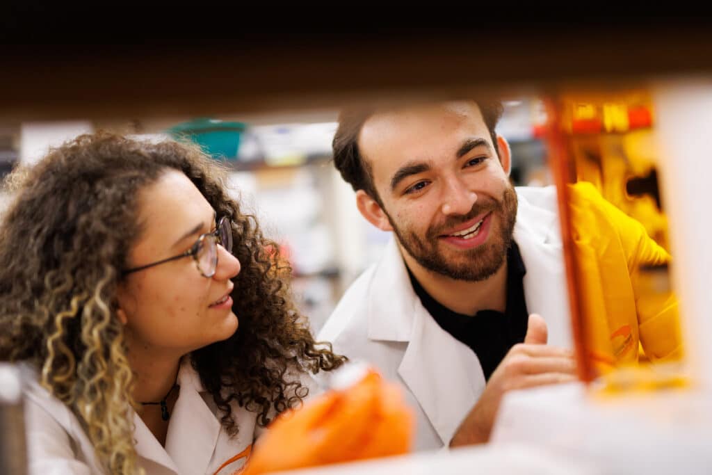 VetMed PhD student Eli Christoph and Bredesen Center PhD student Emine Berfu Ozmen discuss bioink to be used in the 3D printer in the Regenerative Medicine and Tissue Engineering Lab inside the College of Veterinary Medicine
