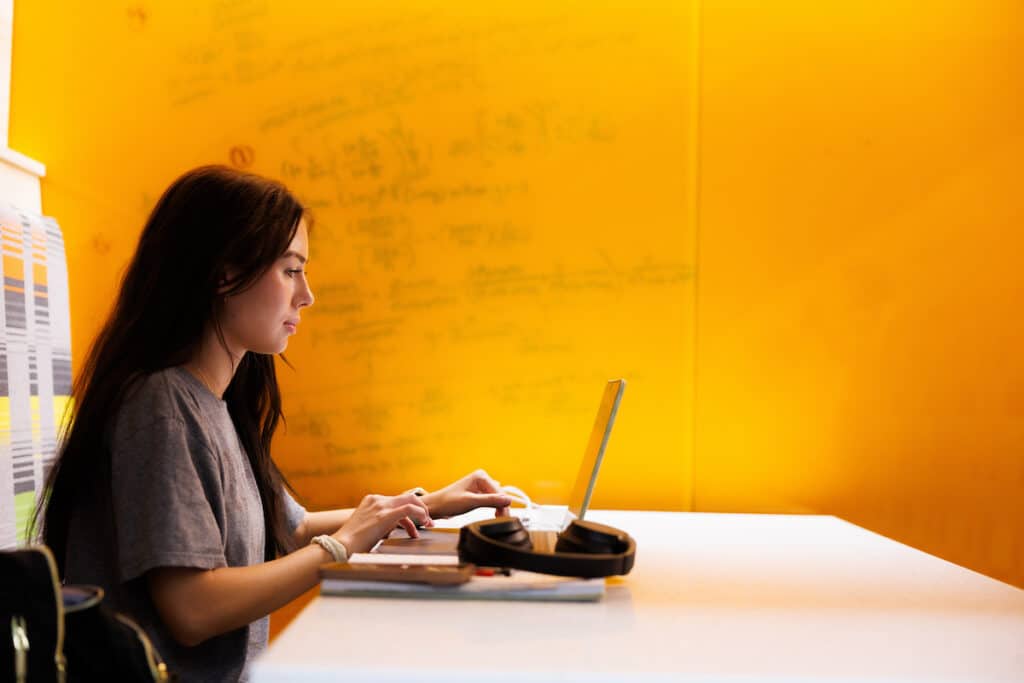 A student studies inside in a booth inside the Zeanah Engineering Complex on August 29, 2024. Photo by Steven Bridges/University of Tennessee.
