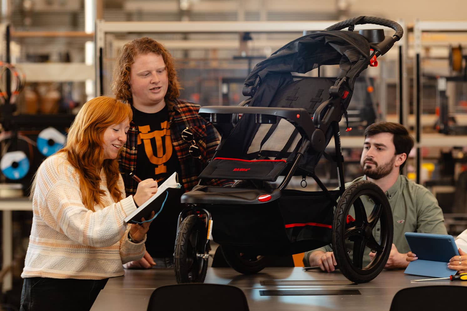 Biomedical engineering senior design team works on their prototype.
