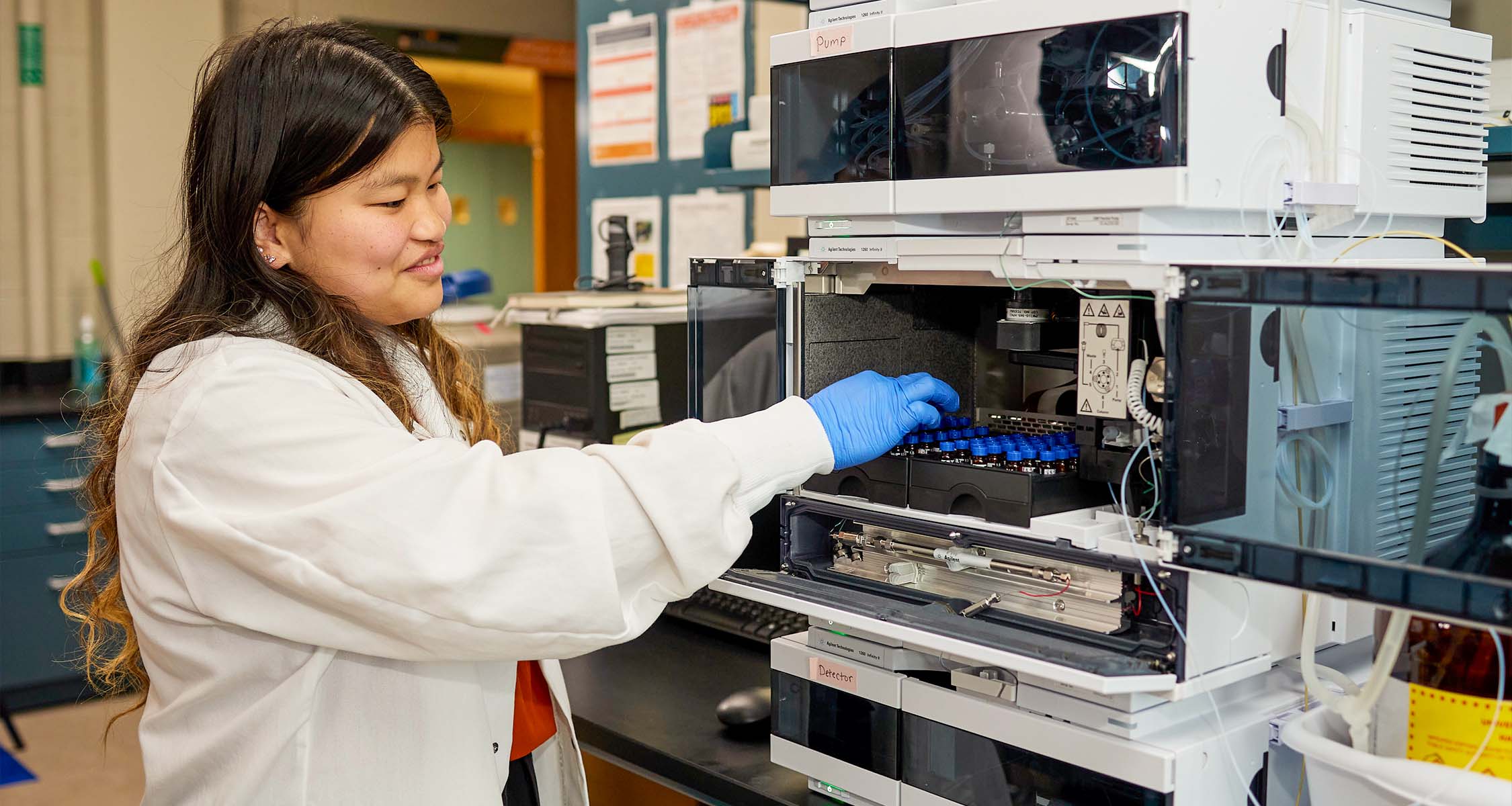 Graduate student works with samples inside Dougherty Engineering Lab