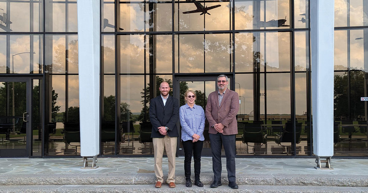 Jackie Johnson and team in front of UTSI building