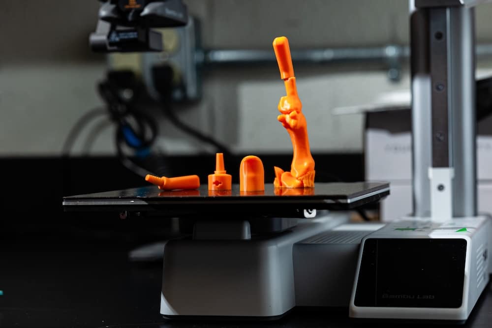 orange prosthetic thumb