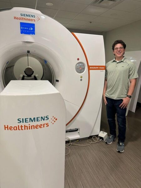 Logan Goodbred at Siemens Healthineers with their new scanner
