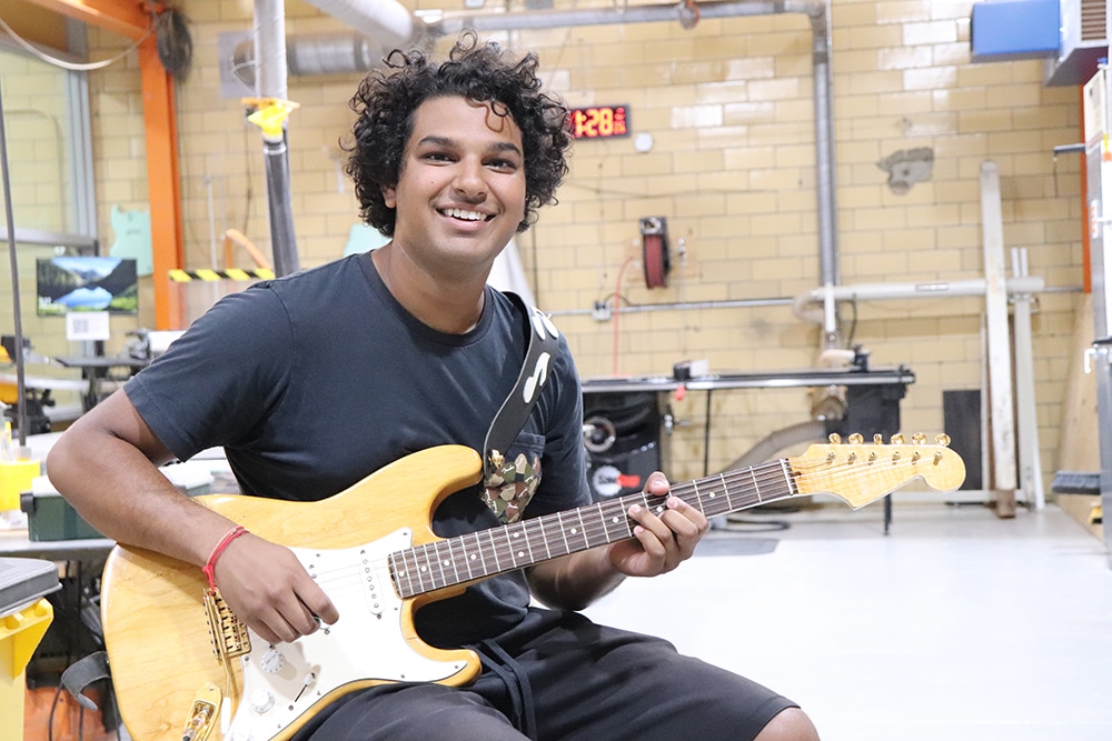 Mitul Mistry in the ICS with his guitar