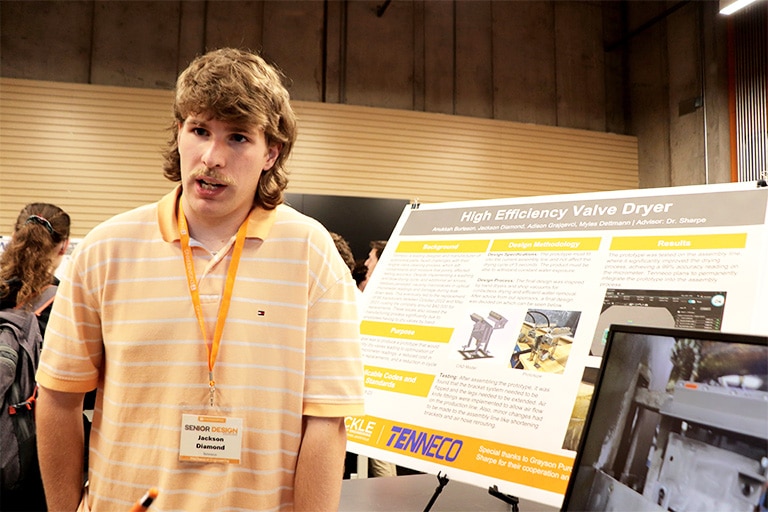 student speaking about his project