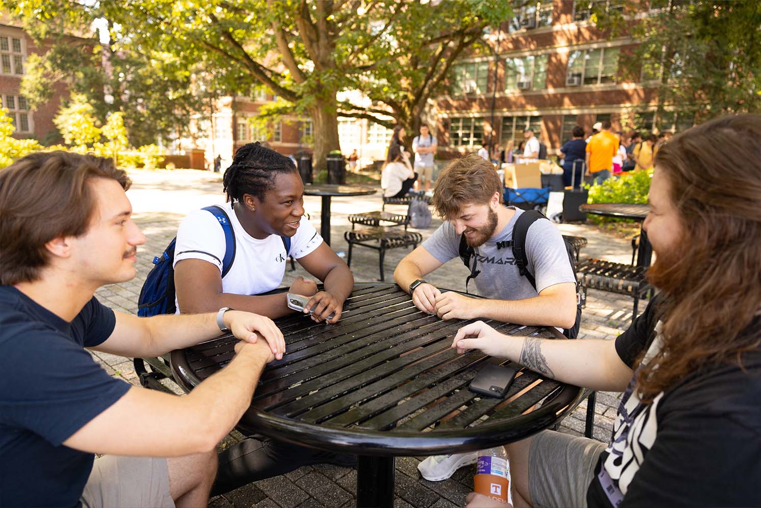 Students sitting around a table in the Engineering Quad