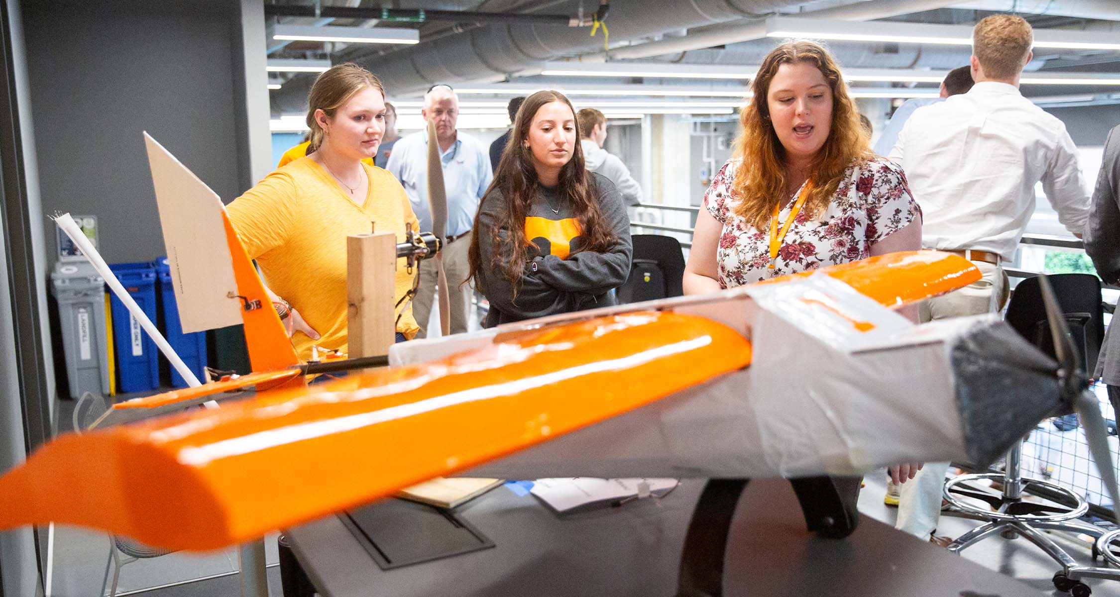 Senior design team demonstrates their plane for their senior design project. 