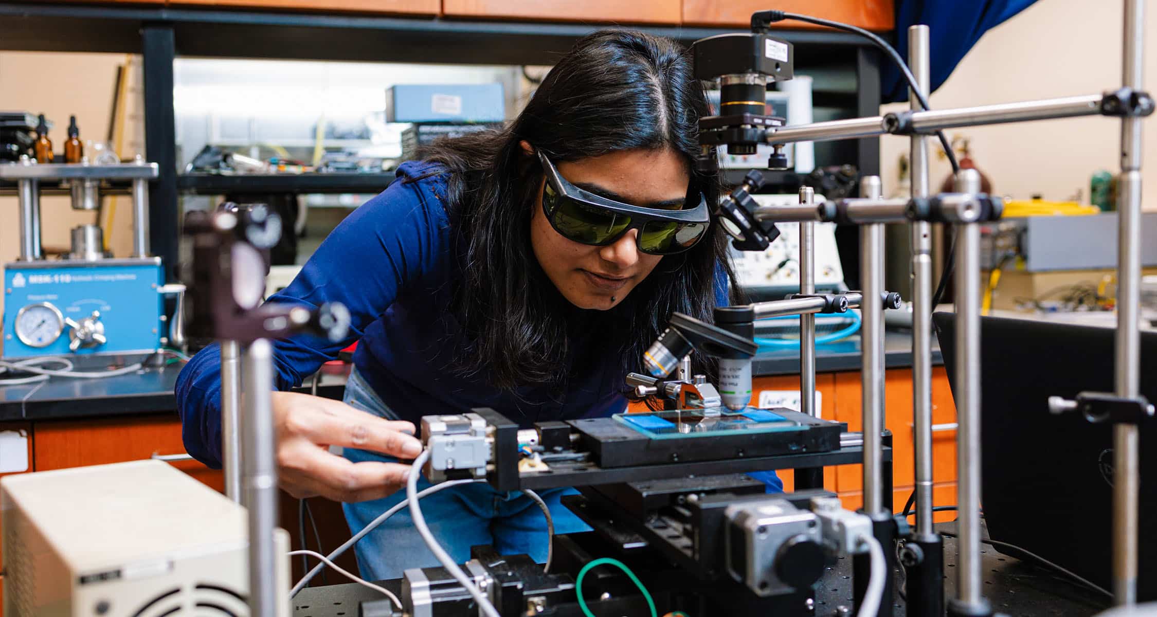 Student works inside Anming Hu's lab