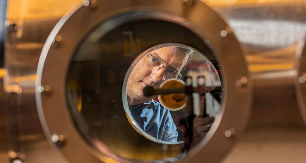 Damiano Baccarella works inside a wind tunnel lab.
