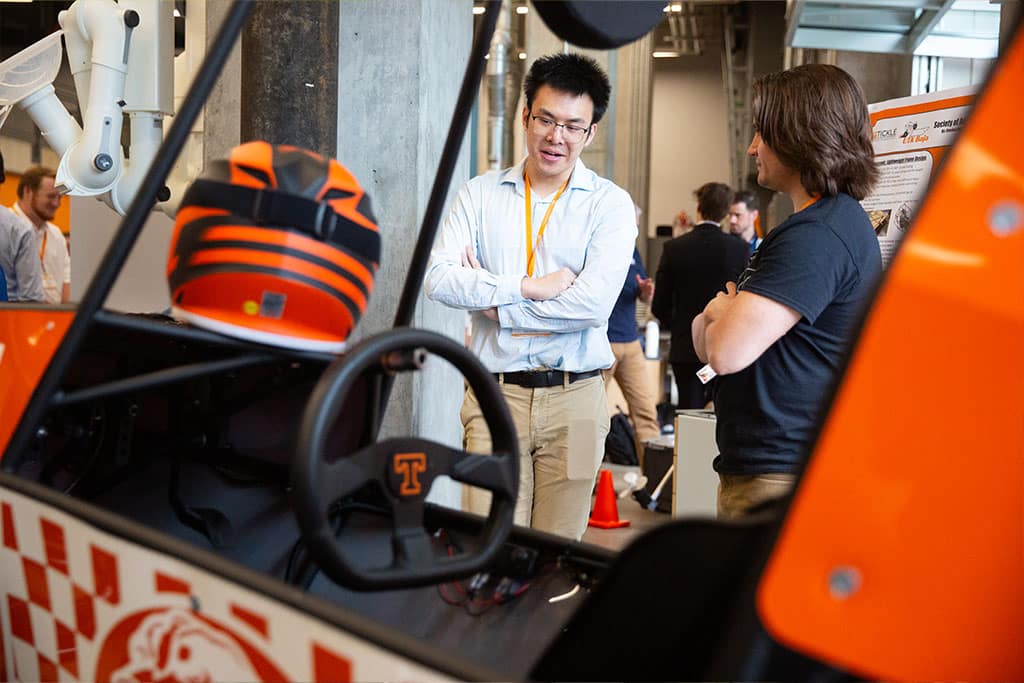 Two students discuss their senior design projects