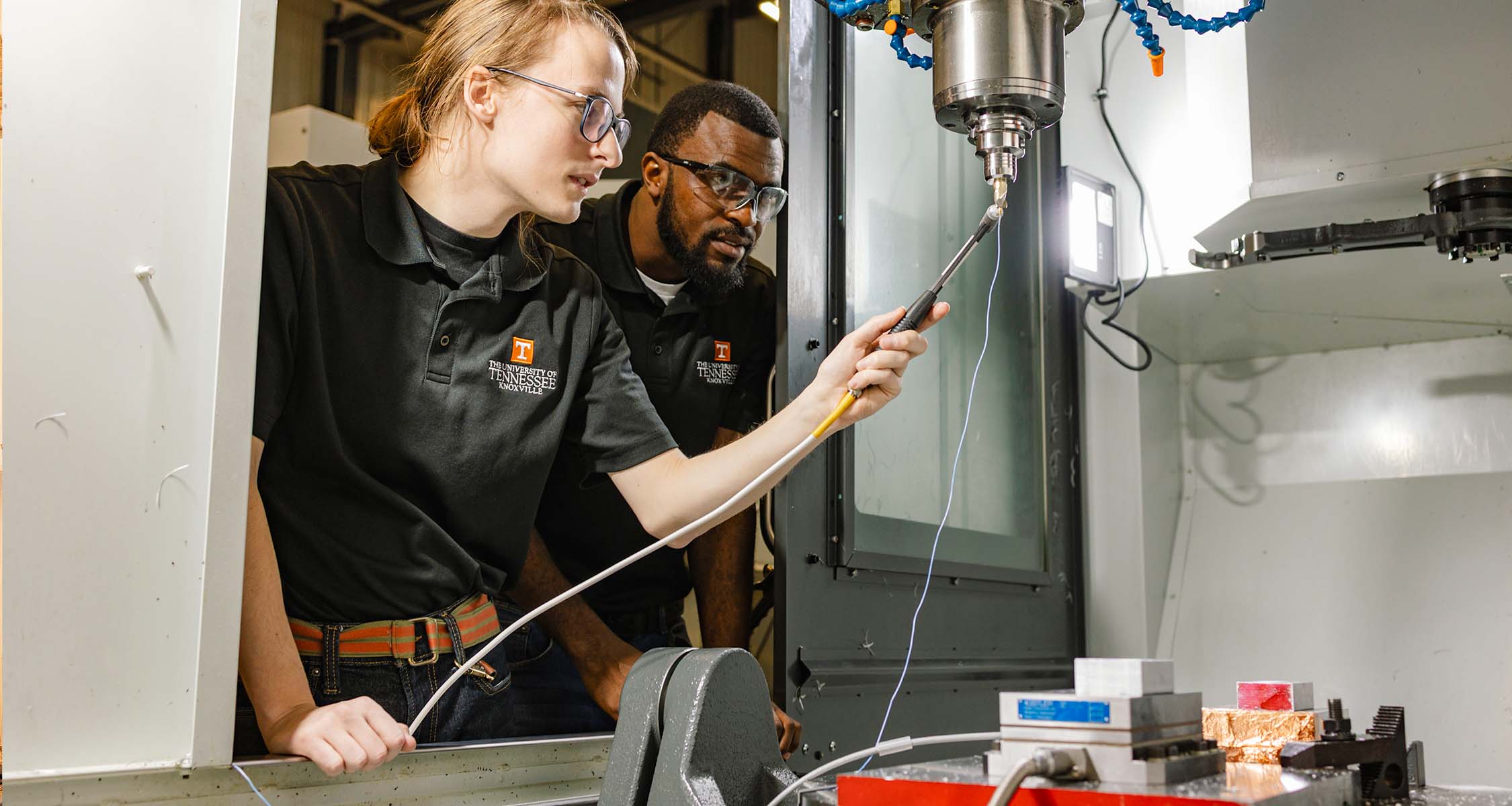 Student work with advanced manufacturing equipment at TN-MADE