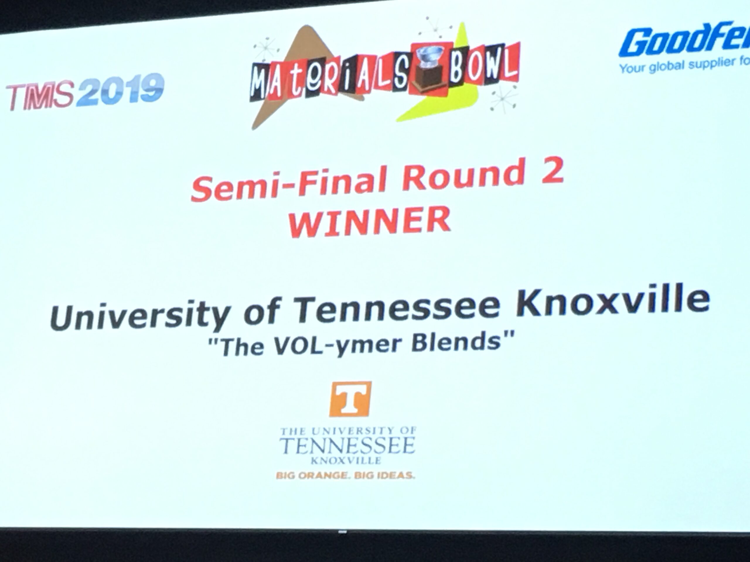 A slide reads "Semi-Final Round 2 WINNER. University of Tennessee Knoxville. The VOL-ymer Blends." 