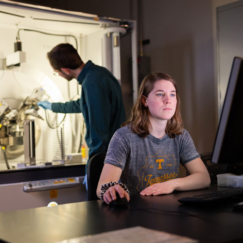 Michael Koehler works on a Empyrean XRD diffractometer with a graduate student in the Diffraction Core Facility