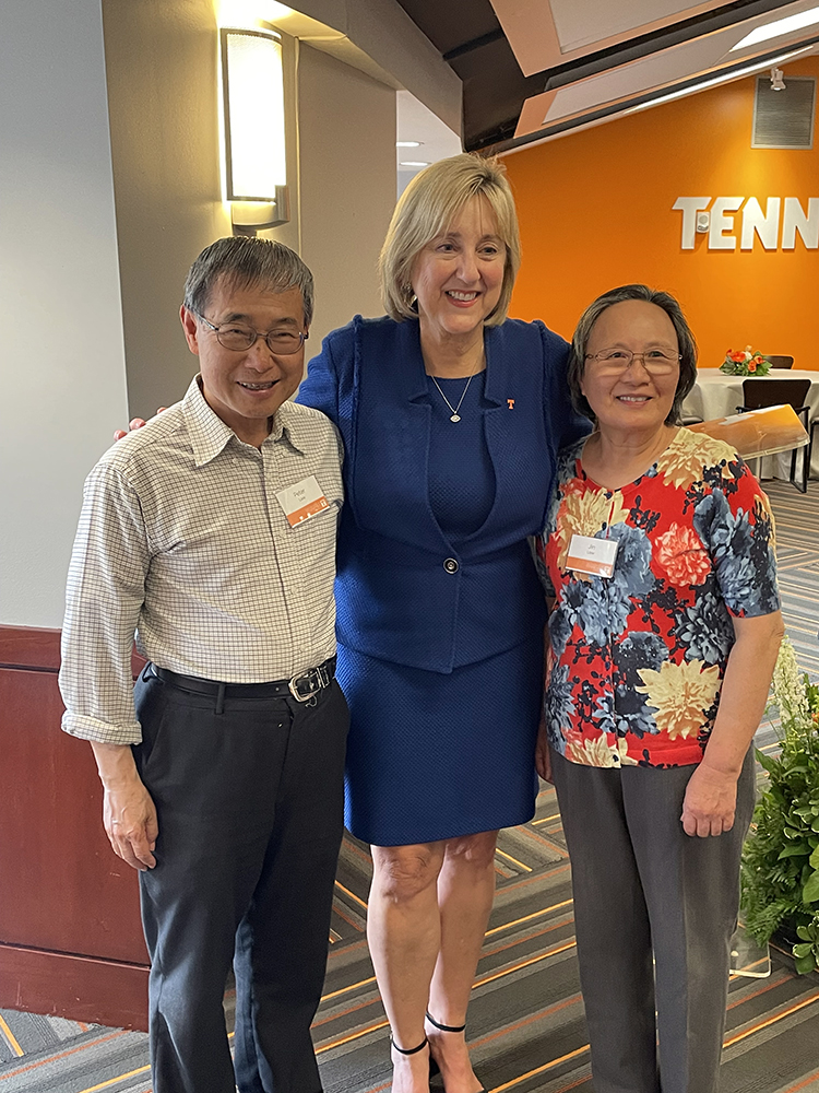 Professor Peter Liaw, pictured here with Chancellor Plowman and his wife Jin, recognized for 30 years of service