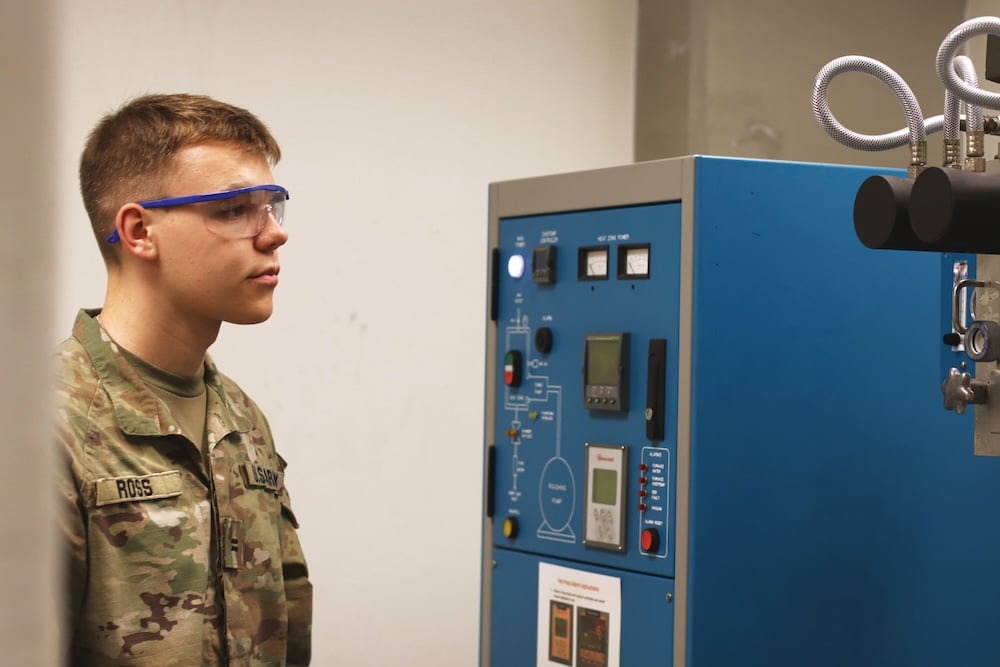 Cadet James Ross working in a lab