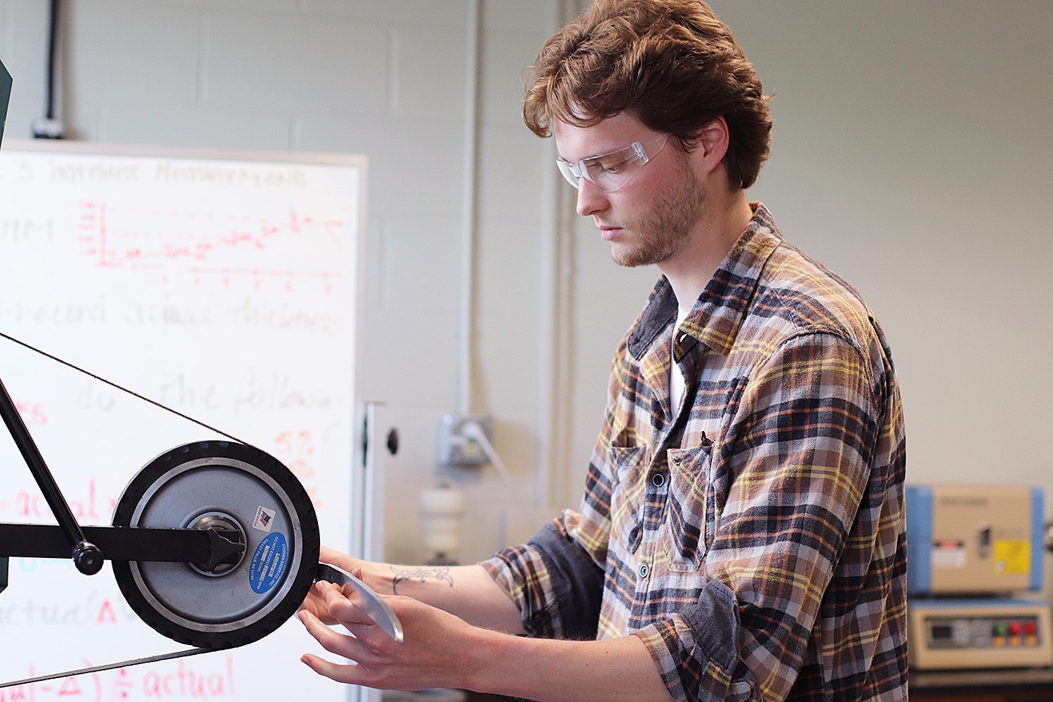 Student working on a sword