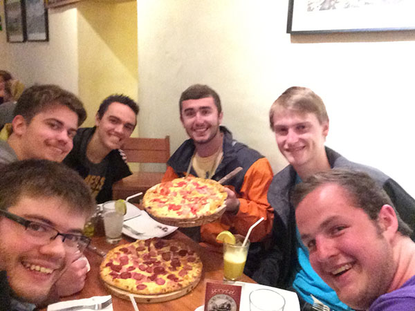 Students Enjoying La Bodega Pizza