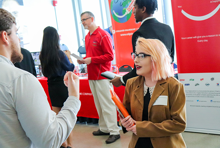 A Tickle College of Engineering Student Meets with a Recruiter at the Engineering Expo