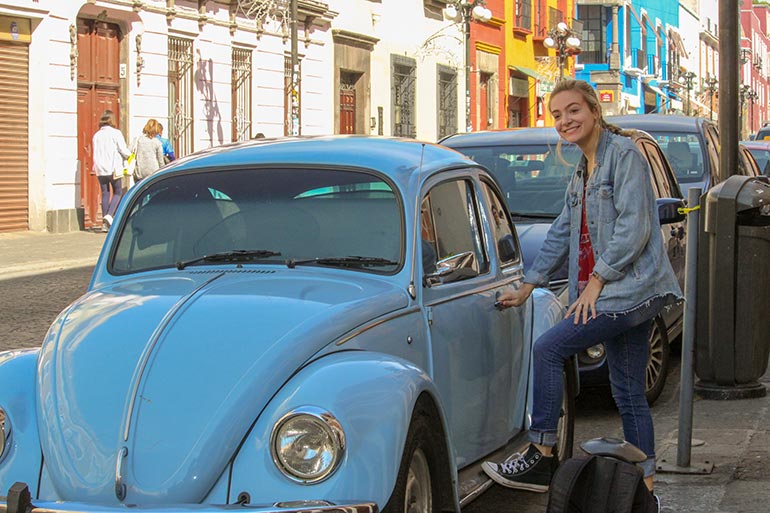 Kate Stiles with a Volkswagen in Mexico