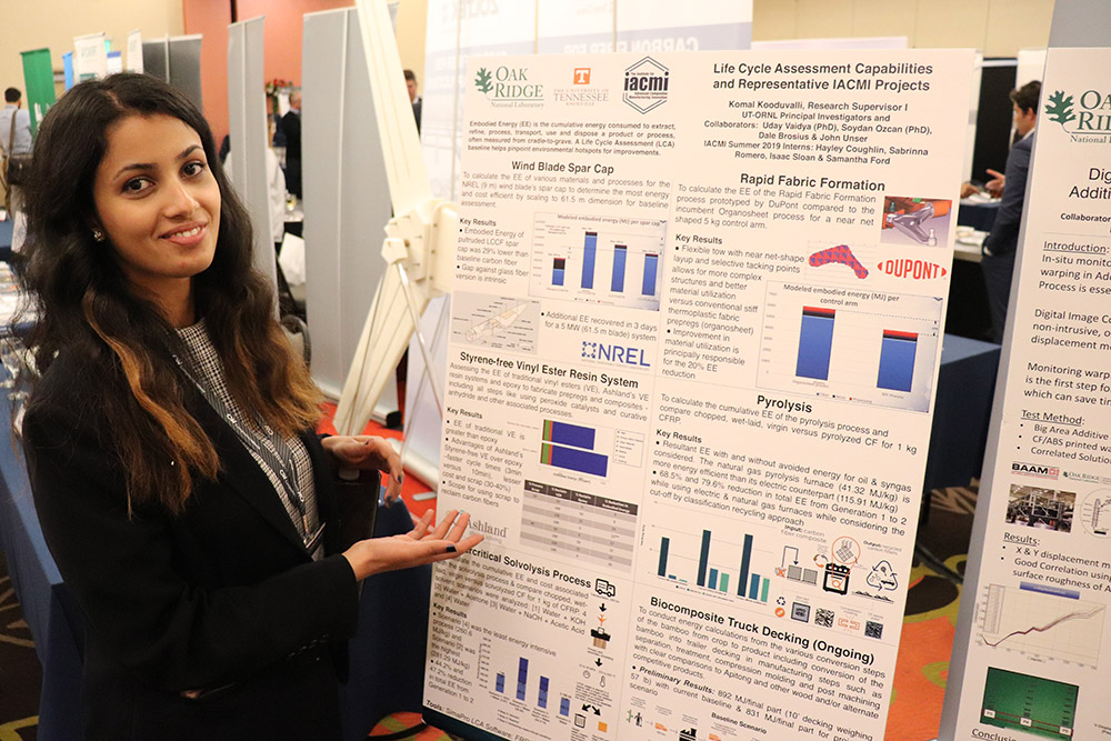 Komal Kooduvalli presents her poster at the conference.