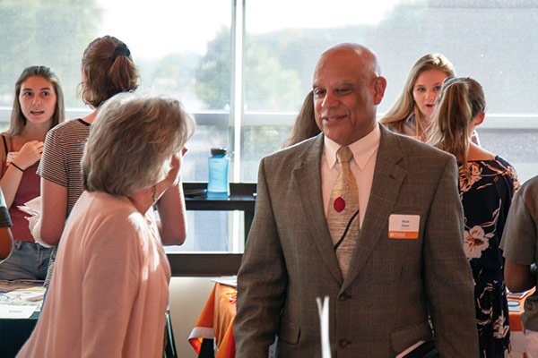 Interim Dean Mark Dean networked with students, faculty, and staff during the dinner.