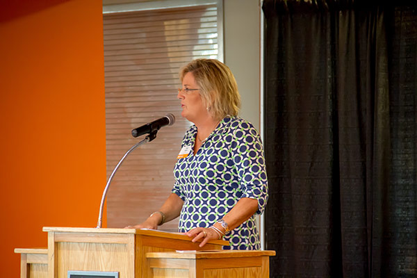 Misty Mayes, alumna and Board of Advisors chair, spoke at the dinner