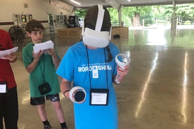 Student uses virtual reality headset.