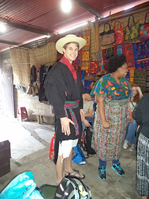 Samuel Scruggs models traditional indigenous dress