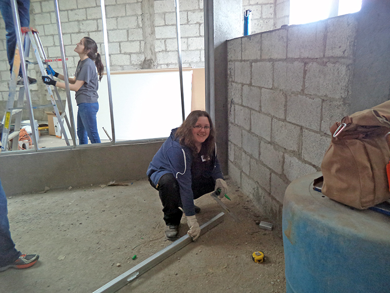 Megan Lamon Working on Construction Project