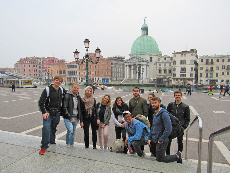 Dennis Morozov Travels to Venice with a Group