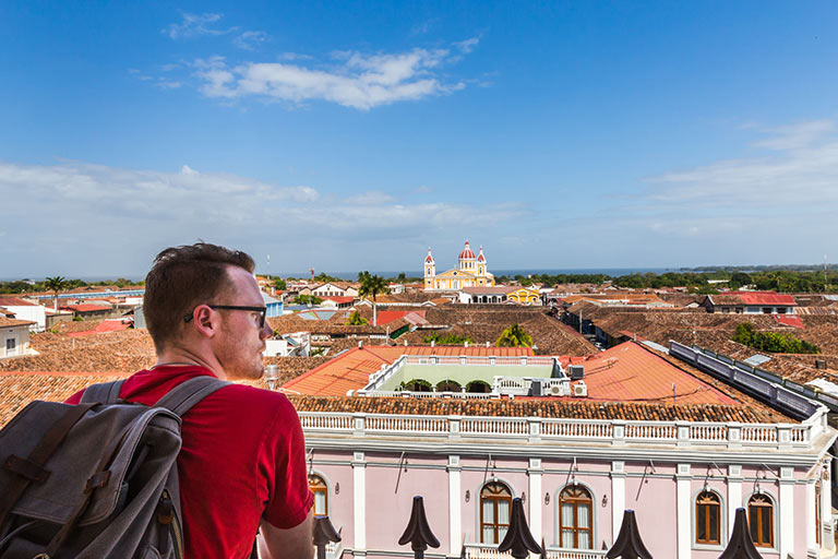 Robert Ledbetter Looks Over Balcony in Granada