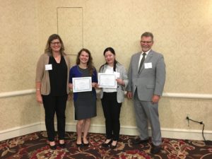 Jiani Tan (3rd from left) and Laura Wilson of Vanderbilt University (2nd from left) receive the A&WMA scholarship presented by Andrea R. Gardiner, Southern section Chair and Scott Freeburn, A&WMA President.