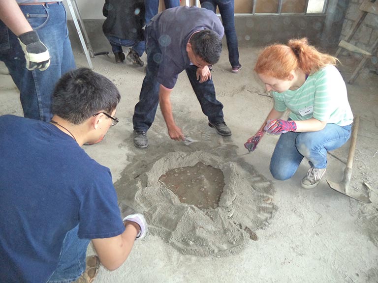 Mary Daffron Mixes Concrete in Guatemala