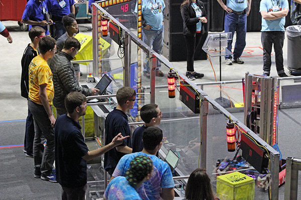 Teams controled their robots from behind protective plexiglass barriers.