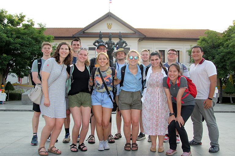 Tickle College of Engineering students and trip guides in front of the Chiang Mai Arts and Cultural Center.