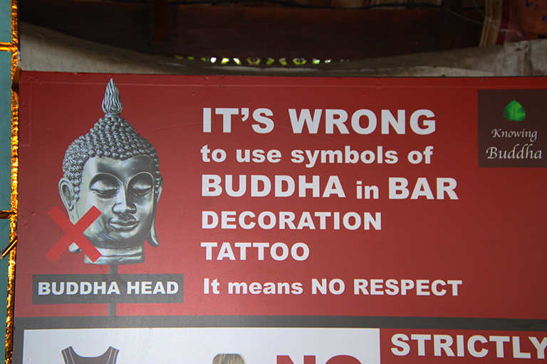 Buddha warning sign.