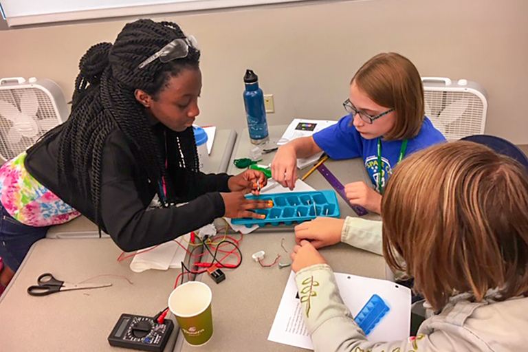 Students participating in CURENT’s Adventures in STEM summer camp work on a project.