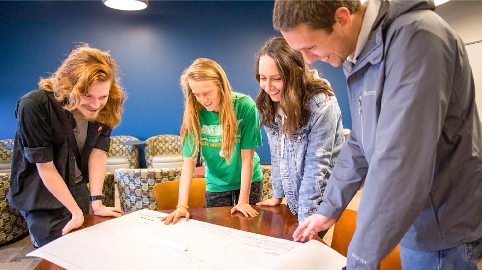 CEE Senior Design Students look over Blueprint