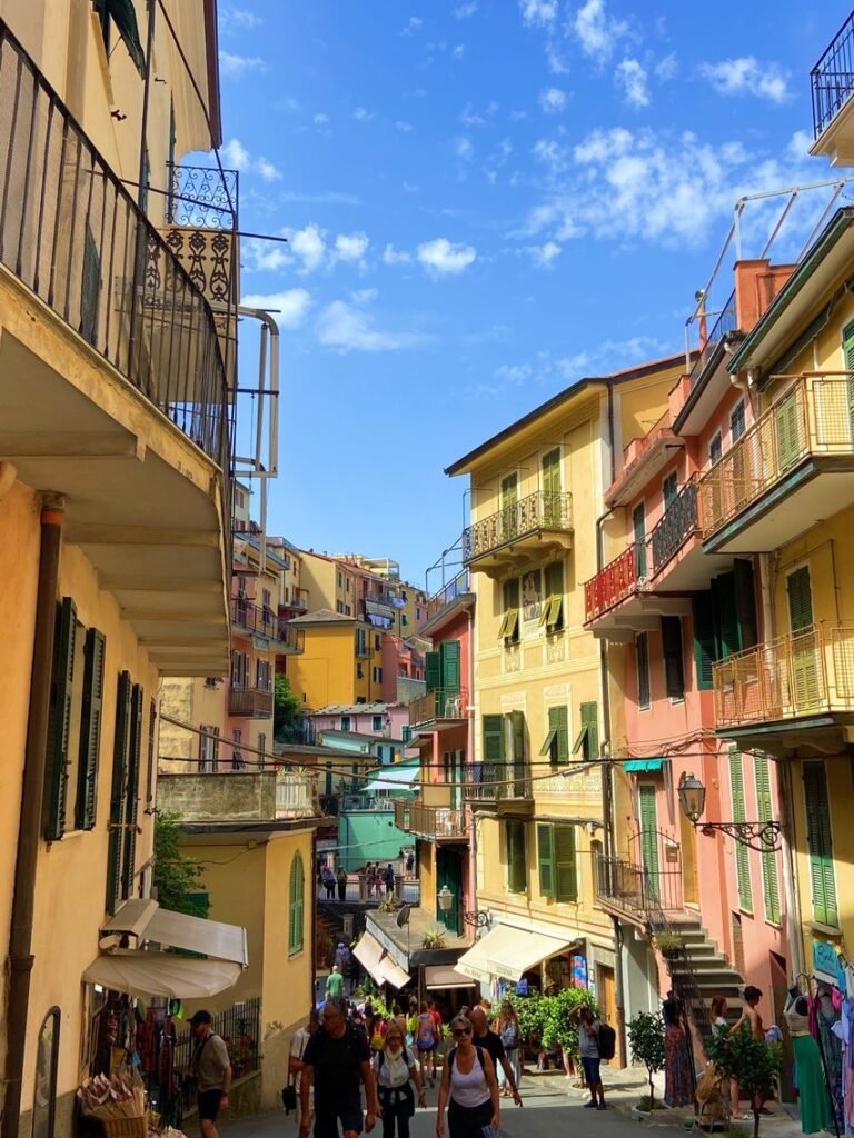 Street lined with colorful buildings in Italy