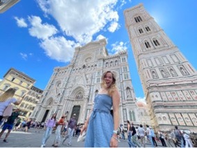 Urbanowicz standing in front of the Duomo