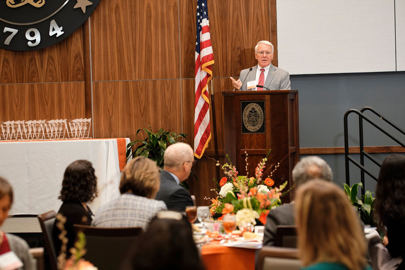 Interim Chancellor Wayne Davis presented awards to 28 faculty members for their excellence in research, creative activities, community engagement, and safety and compliance.