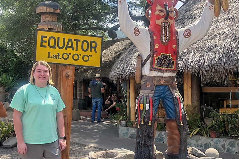 Megan Stanton standing at the equator