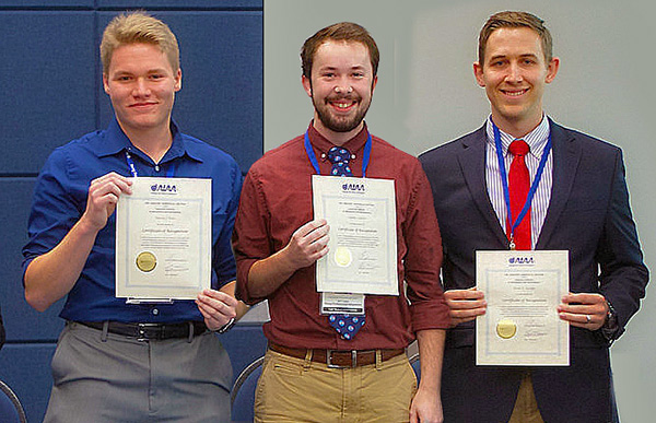 Theron Price, Top Presenter in the Propulsion Technical Session; Adam Harris, Best Presentation winner in the Aerodynamics I Technical Session; and Brian Kocher, Top Presenter, Aerodynamics II Technical Session proudly display their certificates won at The Greater Huntsville Section (GHS) 2017 AIAA second Young Professionals Symposium held at The University of Alabama in Huntsville.