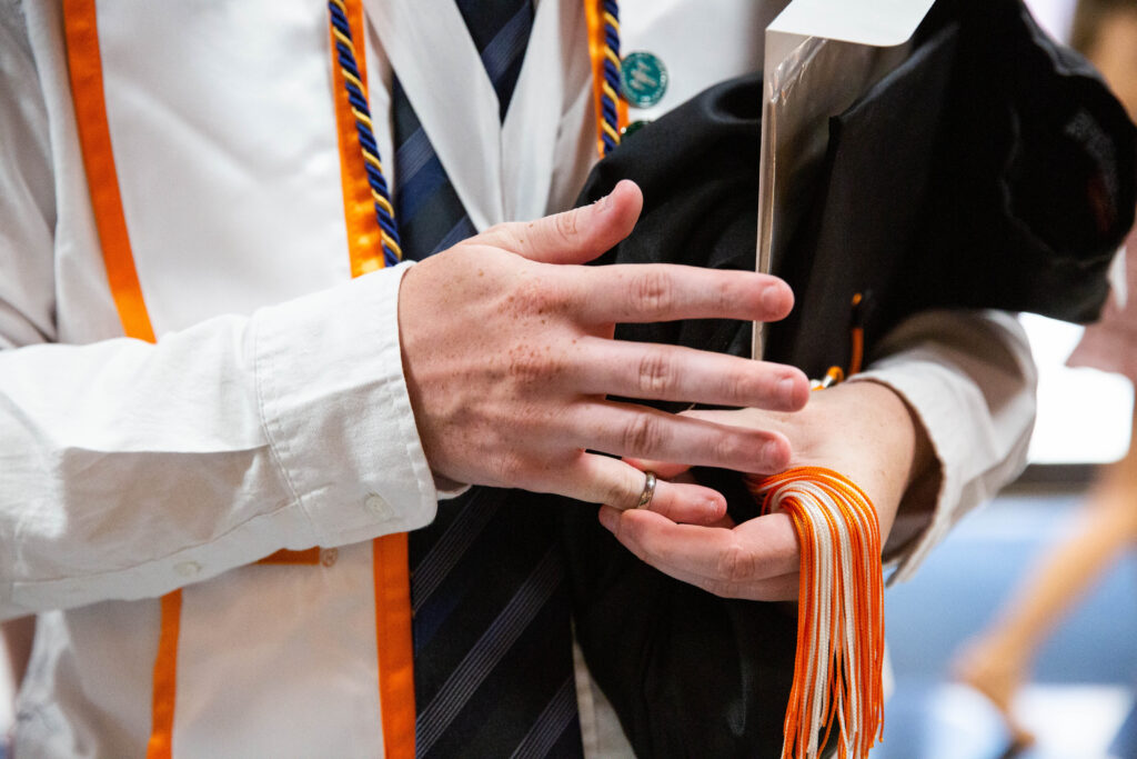 Close-up of student's hands at the Order of the Engineer ceremony
