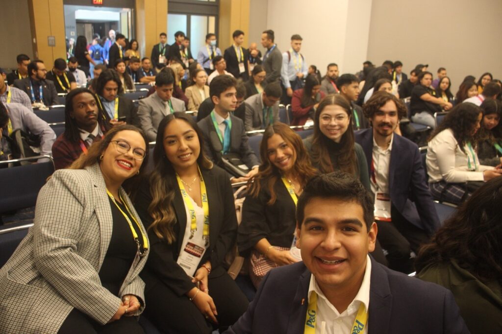 UT Student attend a workshop with other SHPE members at the Charlotte Convention Center. (Pictured left to right: Iliane Domenech, Valeria Huarote, Maria (Toya) Cortez, Jenifer Rodriguez, and Vince Dick. Front: Eduardo Diaz)