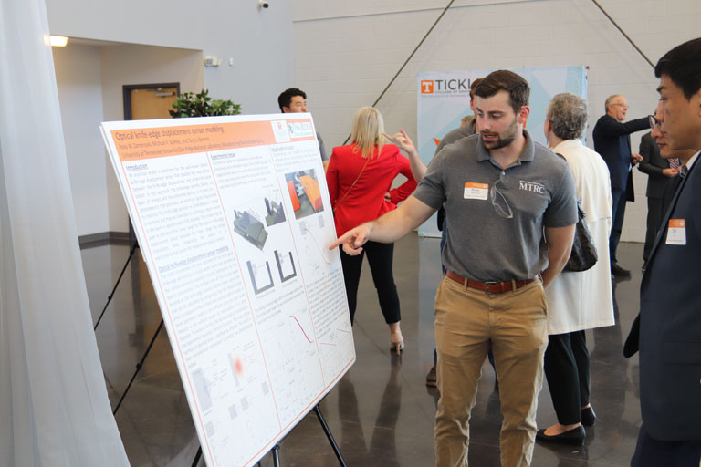 MTRC student presents their research at naming event