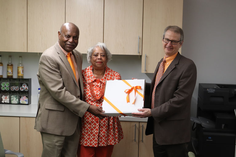 Paul Frymier presents gift to Harold and Joyce Conner. 