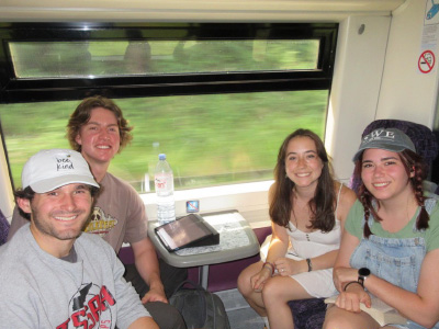 Lauren Harnetty and other Engineering in London study abroad students riding on a train.